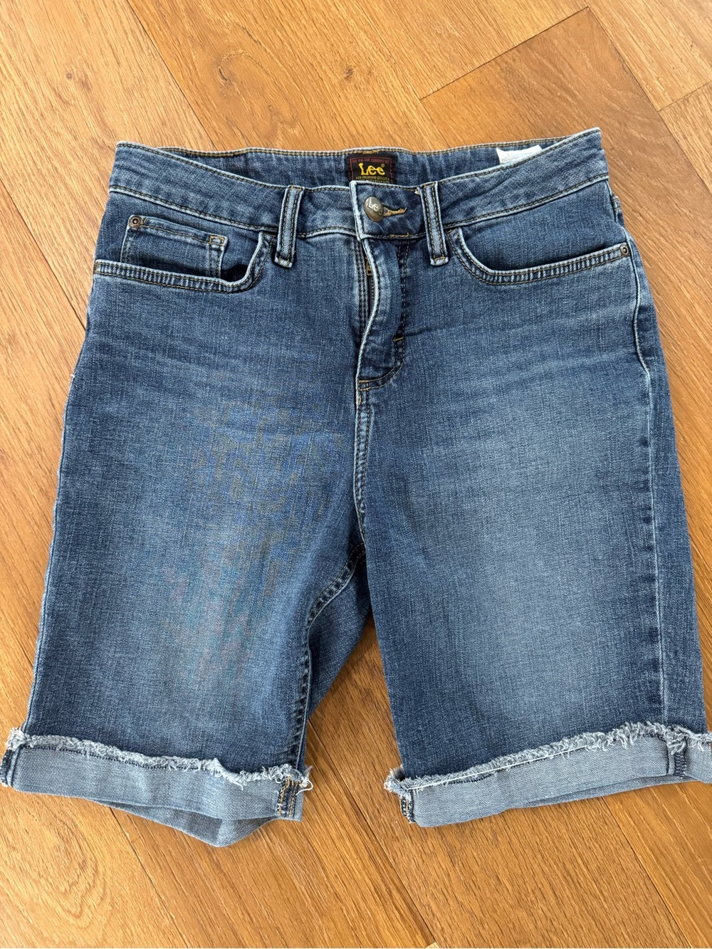 Lee Women's Denim Bermuda Shorts in Medium Blue with Frayed Hem
